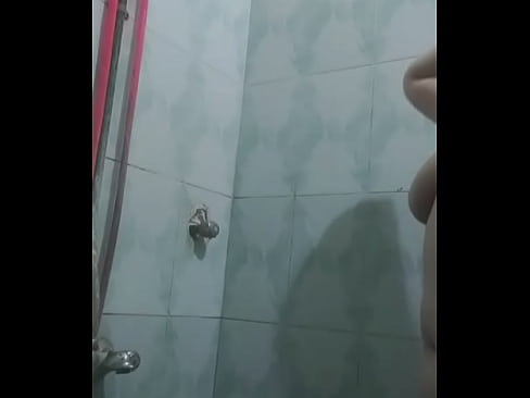 An Egyptian girl taking a shower