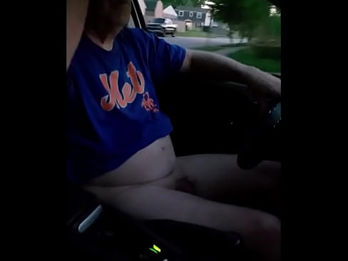 Old man drives naked in evening