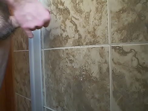 Cumming on the bathroom wall