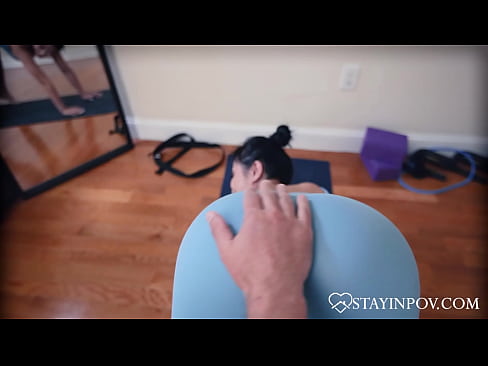 Asian Yogi Stretches At Home