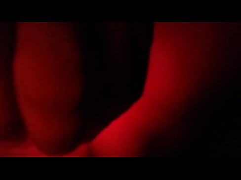 Anal masturbation with a light stick in the dark