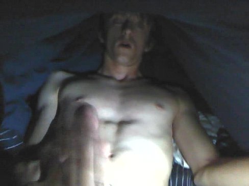 Guy Masturbating Under Blankets
