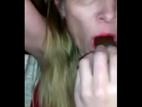 Jasmine masturbating with a candybar