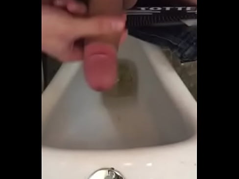 nice cum shot after stroking in public bathroom