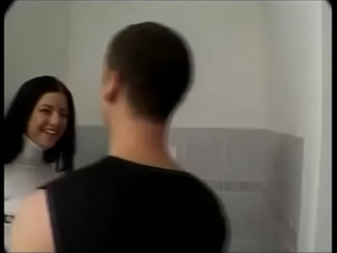 Brunette Sucking Cock in a Public Bathroom