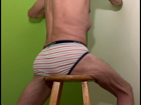 Striped Underwear male deep pubic mayofascial release on Stool