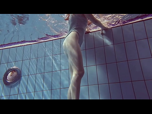Russian cute tight petite babe Libuse underwater swimming