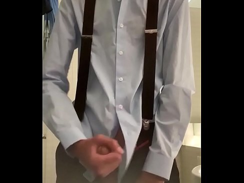 Boy masturbating in blue dress shirt and suspenders