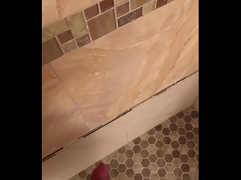 Latino stroking dick in shower