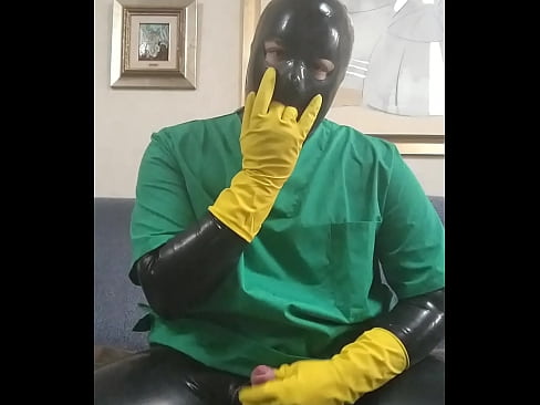 Rubber surgeon masturbating