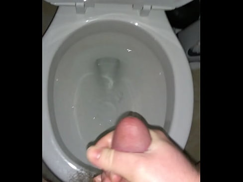 Asian twink unloads his balls in the toilet