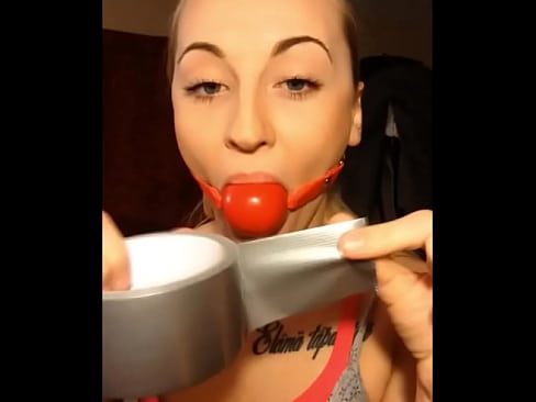 Blonde Slut Gagging Herself With Ballgag And Tapegag