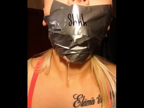 Blonde Slut Gagging Herself With Ballgag And Tapegag