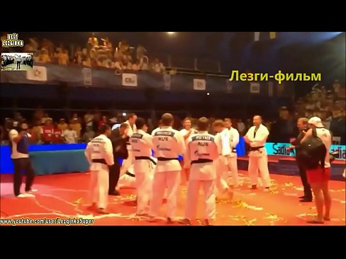 Muscled winner is dancing russian dance 'Lezginka" after fight