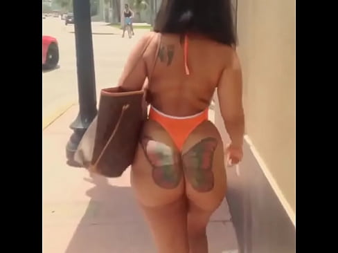 following butterfly butt on the sidewalk