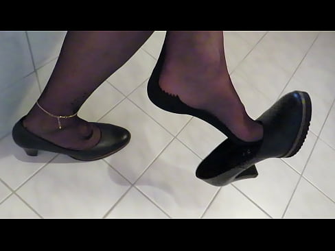 French Queen of shoeplay loves to dangle her "GABOR" high heels