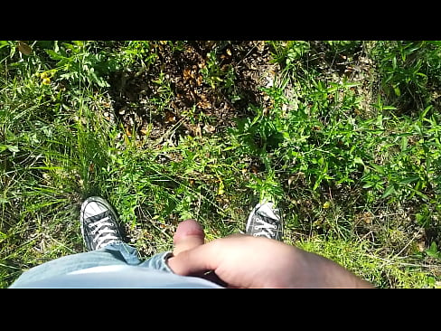 Pissing outdoors on a sunny day