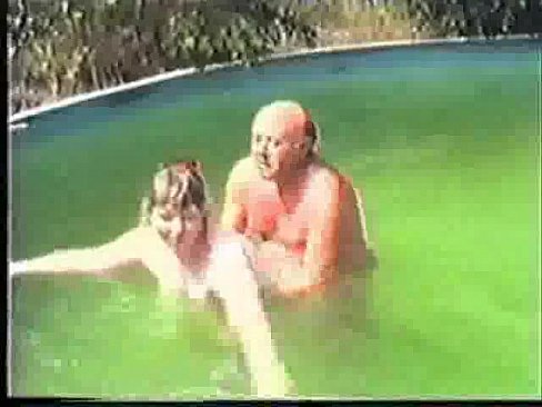 Older amateur couple in pool