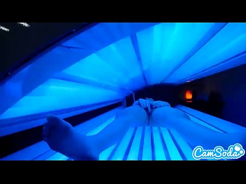 teen latina gets caught rubbing her clit while using a tanning bed