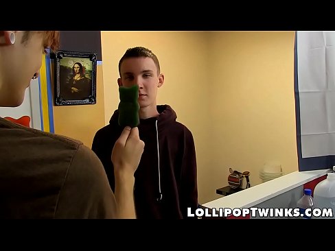 Twink loves licking lollipops and dick