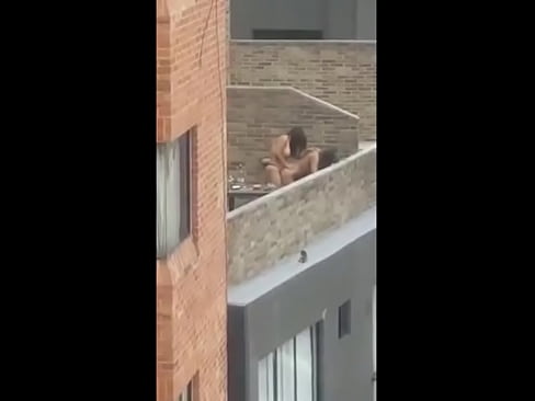 2 girls having sex on terrace