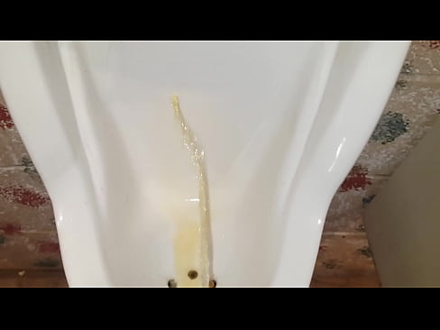 Pissing at public urinal, showing power of my kegel muscles ;)