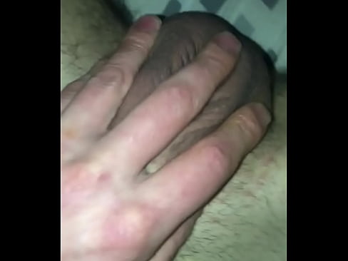 Rubbing the base of my cock all the way down right between my balls! Feels great