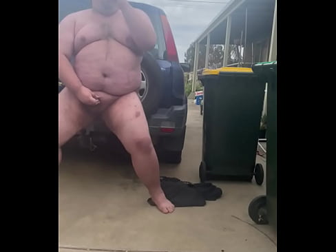 Sucking dildo behind car