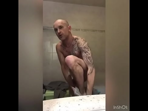 Tattoed dude showing his sexy body