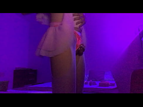 Scarlet Sissy dancing in chastity and with a butt plug