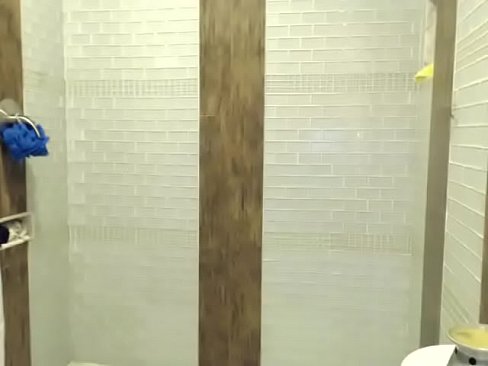 Latina woman taking shower live show