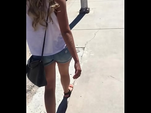 Sexy girl in booty shorts walking voyeur