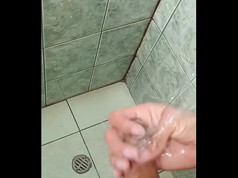 man in the shower ends up masturbating until he comes - watch the end