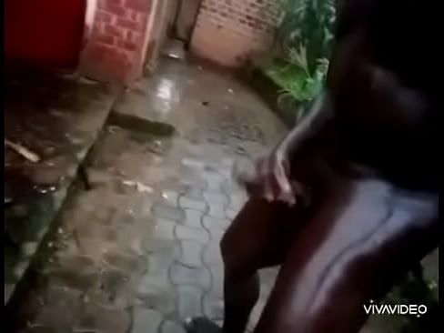 Darkest Ugandan guys shows I his big black african dick in rain