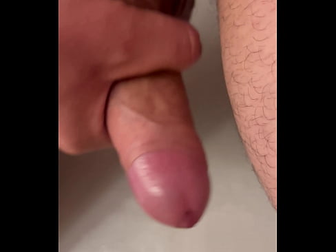 Slowly wanking dick while getting bigger