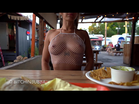 Tits exposed at the restaurant