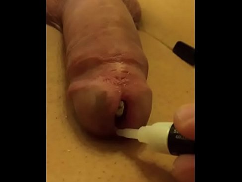 Penis gets filled with metal marbles balls and penis hole sealed with superglue