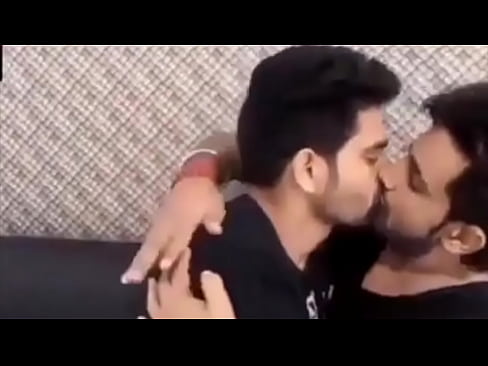A couple of young boys from India kissing each other crazily