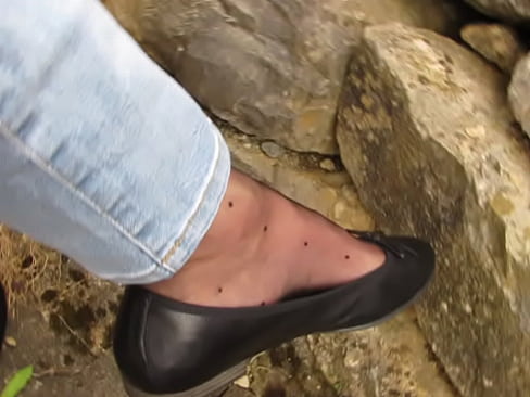 French Queen of shoeplay dangles in public