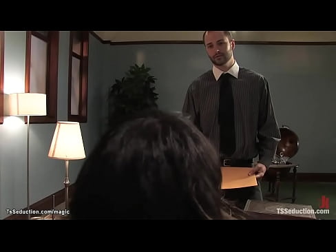 Big tits brunette Asian TS attorney Yasmine Lee preparing for trial when nervous assistant David Chase appears then she bind and anal fucks him with big cock