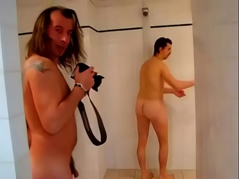 Naked rugby players get touchy feely in the showers...