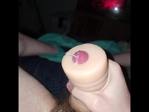 Huge cumshot through toy.