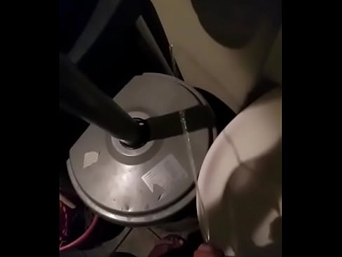 Man pissing in sink in restuarant