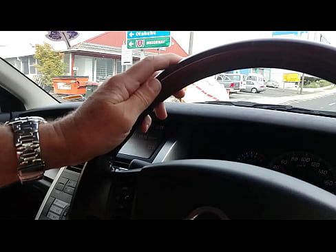 Dirty bitch sucks cock in the car while driving down the road