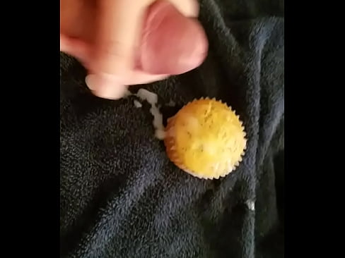 Dick Tracy Senior frosts a cupcake with cum