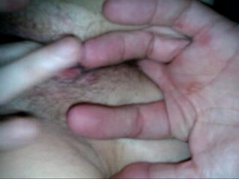 fingering her wet pussy and ass