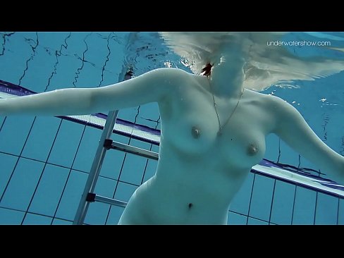 Russian beauty Lada with natural nice tits in the pool