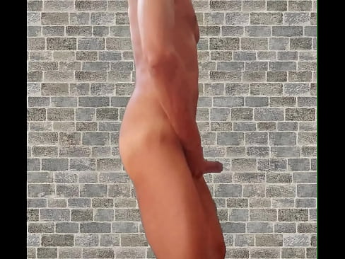 Cock playing and jerking by the brick wall