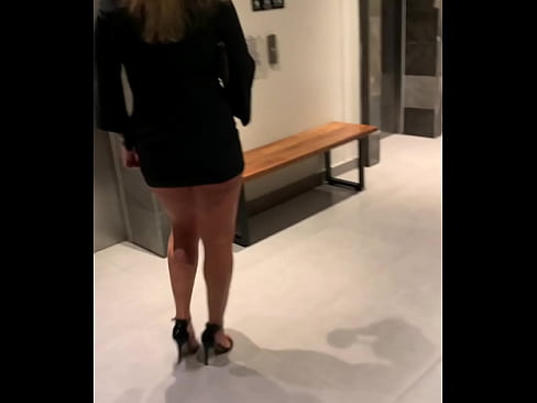 Pussy and ass flashing by milf hotwife at hotel hallway.