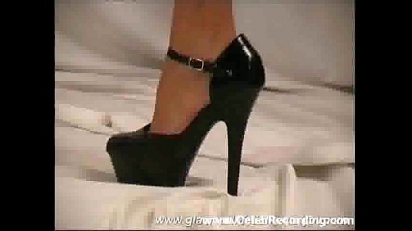 Glamour babe Roxana posing in high heels